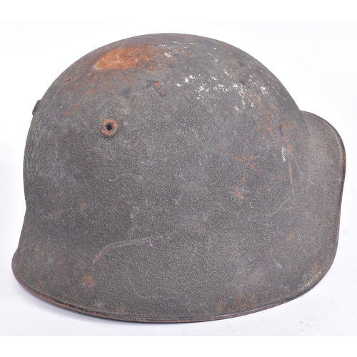 191 - An early 20th Century / WWI First World War Eastern European Military helmet, likely Russian or neig... 