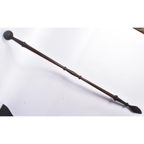 195 - An early 19th Century British Navy polearm. Turned wooden shaft with a weighted bulbous end and a sp... 