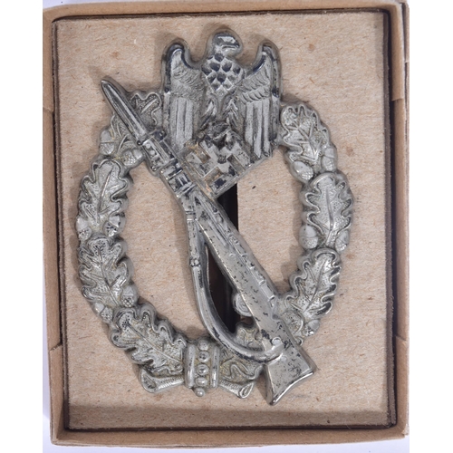 196 - A WWII Second World War Third Reich Nazi German Infantry Assault badge. The badge being a silver gra... 