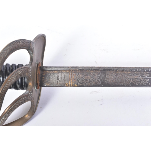 20 - A 19th Century Belgian presentation cavalry sabre. Ornate 3 bar brass hilt carved with scrolling mot... 