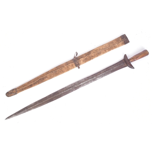 202 - A mid 20th Century Northern Cameroon Guduf People sword. The sword with a wooden hilt and crossguard... 