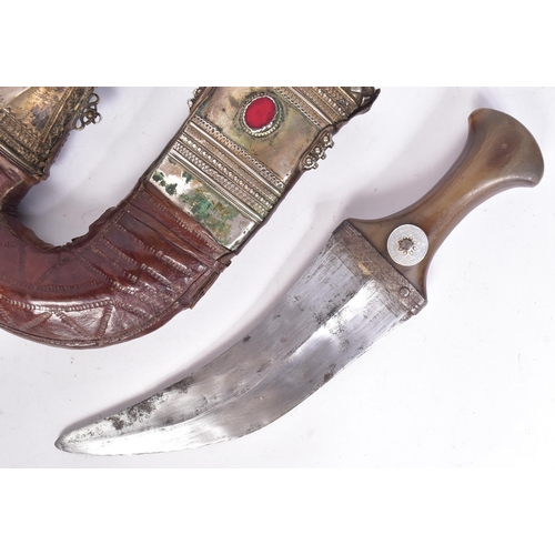 21 - An original South Arabia ( Hadhramaut Yemen ) Gusbi Khanjar Jambiya dagger. Rhino horn hilt with sil... 