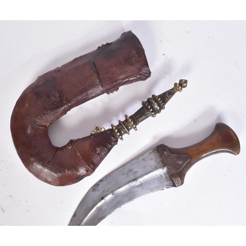21 - An original South Arabia ( Hadhramaut Yemen ) Gusbi Khanjar Jambiya dagger. Rhino horn hilt with sil... 