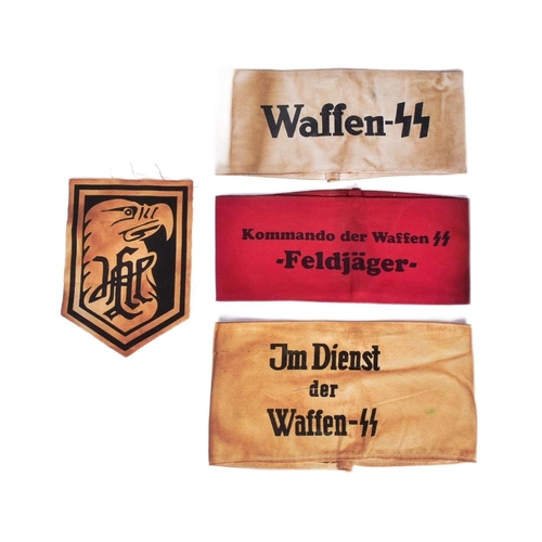 219 - A collection of WWII Second World War style Third Reich Nazi German Waffen SS armbands along with a ... 