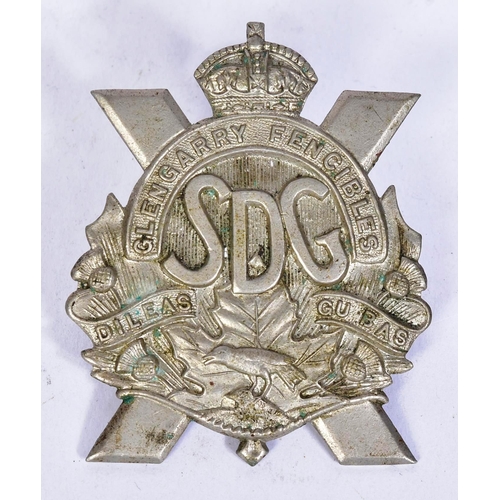 227 - Two Canadian military uniform cap badges comprising the Calgary Highlanders and Glengarry Fencibles.