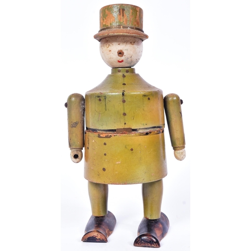 231 - A believed WWI First World War era wooden figure of a French soldier wearing a Kepi hat. Two piece w... 