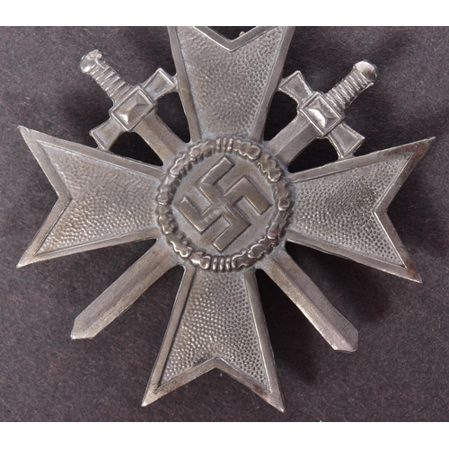 235 - A WWII Second World War Third Reich Nazi German War Merit Cross. A 1st Class Military example with c... 