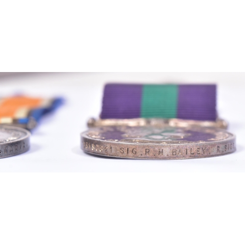 241 - A collection of assorted medals comprising a WWI First World War medal awarded to one 34556 Pte E. P... 