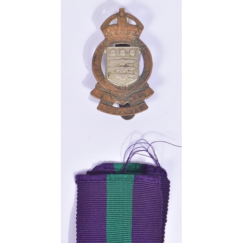 241 - A collection of assorted medals comprising a WWI First World War medal awarded to one 34556 Pte E. P... 