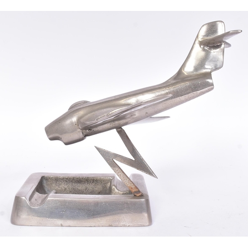 243 - A mid-century Art Deco style c1950s jet plane aircraft ashtray of steel construction. Mounted with a... 