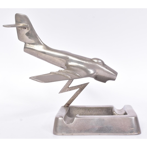 243 - A mid-century Art Deco style c1950s jet plane aircraft ashtray of steel construction. Mounted with a... 