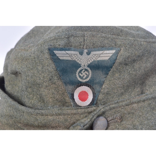 246 - A WWII Second World War Third Reich Nazi German M43 cap with Light Infantry Mountain Troops insignia... 