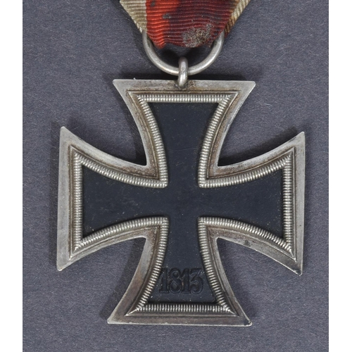 252 - A WWII Second World War Third Reich Nazi German Iron Cross medal. A Second Class example of two part... 