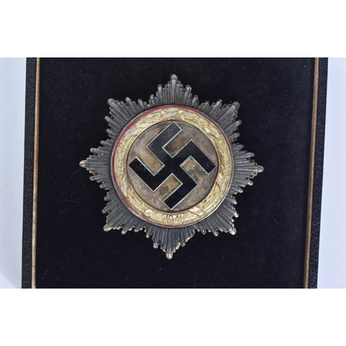 257 - A replica WWII Second World War Third Reich Nazi German ' Deutsches Kruez ' ( The German Cross ) med... 