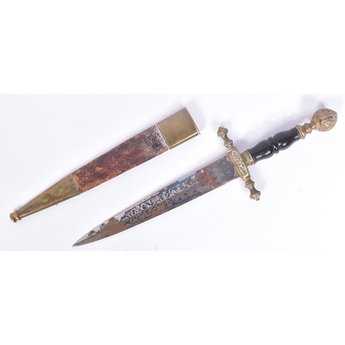 259 - A 19th Century Spanish dagger with Toledo blade. Dome shaped brass pommel with scrolling motifs, bla... 