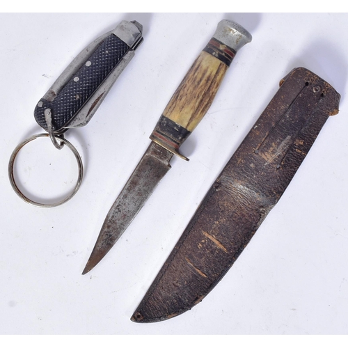 269 - A WWI First World War British Military jack knife and a bone handled boot knife. The jack knife with... 