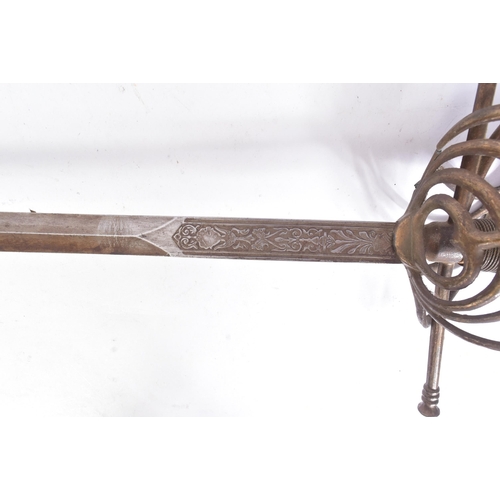 277 - A 19th Century Renaissance style rapier sword a with a sweeping ringed basket hilt, wire bound grip ... 