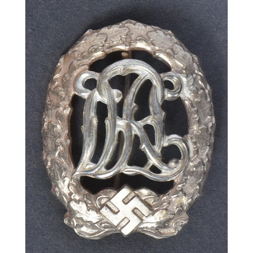 278 - A WWII Second World War Third Reich Nazi German DRL Sports badge. The badge depicting a the initials... 