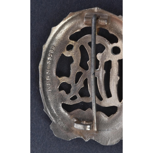 278 - A WWII Second World War Third Reich Nazi German DRL Sports badge. The badge depicting a the initials... 