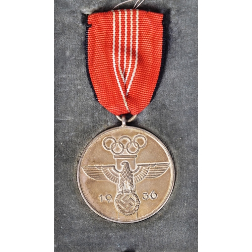 279 - A WWII Second World War Third Reich Nazi German 1936 Berlin Olympics civil decoration medal. The med... 