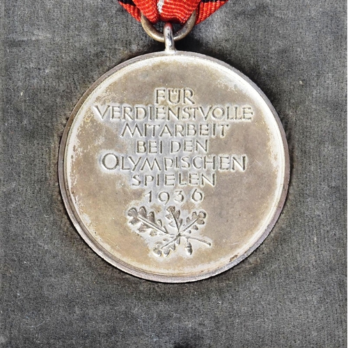 279 - A WWII Second World War Third Reich Nazi German 1936 Berlin Olympics civil decoration medal. The med... 