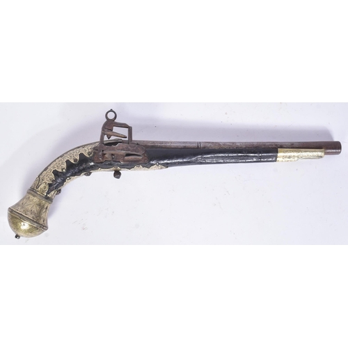 287 - A 19th Century Ottoman Empire flintlock / miquelet lock pistol / kubur. Silver gilt covered stock et... 