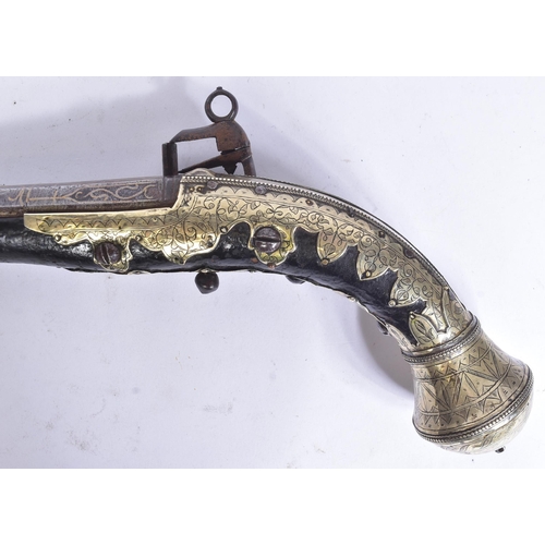 287 - A 19th Century Ottoman Empire flintlock / miquelet lock pistol / kubur. Silver gilt covered stock et... 