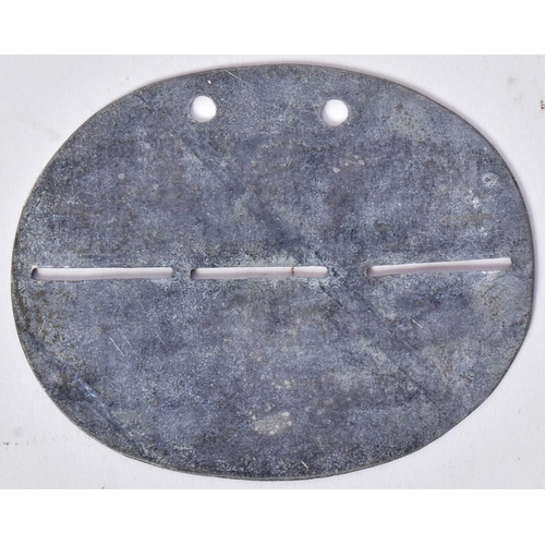 298 - A WWI First World War Imperial German / Prussian Army soldiers dog tag. Oval shape with Top and bott... 