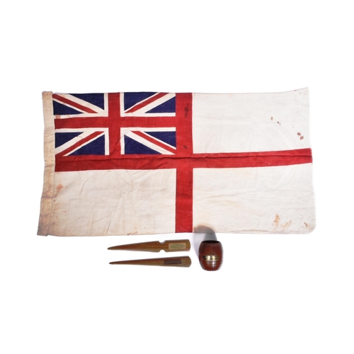 318 - Royal Navy Interest - a Royal Navy ensign flag along with x3 teak wood pieces from naval ships compr... 