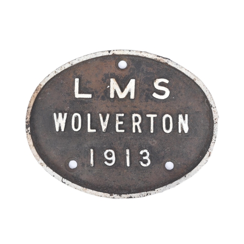 327 - Railwayana - an early 20th Century cast iron railway sign reading LMS Wolverhampton 1913. Black with... 