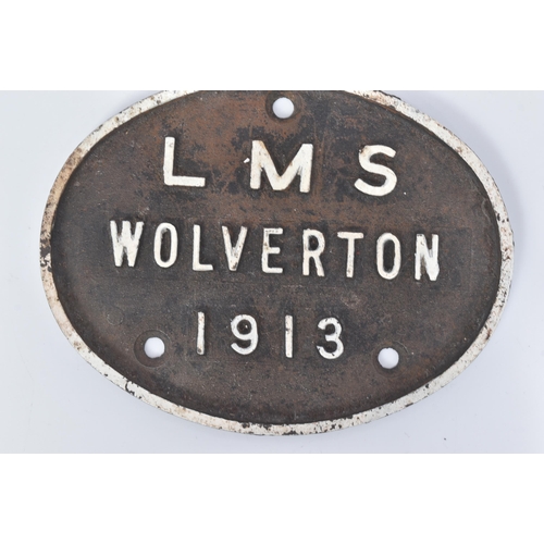 327 - Railwayana - an early 20th Century cast iron railway sign reading LMS Wolverhampton 1913. Black with... 