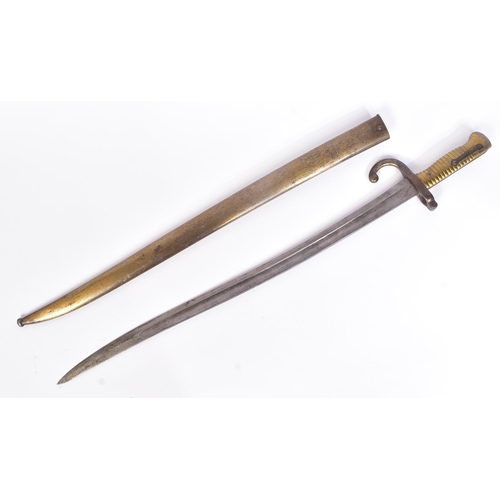 329 - A 19th Century French 1866 pattern ' Chassepot ' rifle bayonet. The bayonet having ribbed brass hilt... 