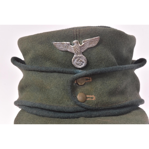 330 - A WWII Second World War Third Reich Nazi German Forestry Service M43 cap. Khaki green wool with a da... 