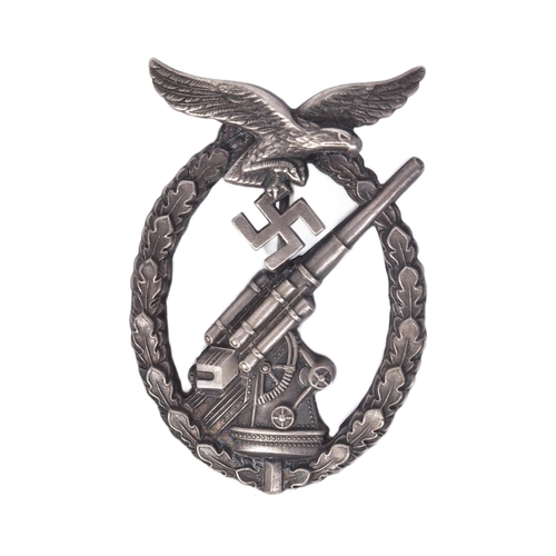 339 - A WWII Second World War Third Reich Nazi German Anti Aircraft / Army Flak badge. The badge depicting... 