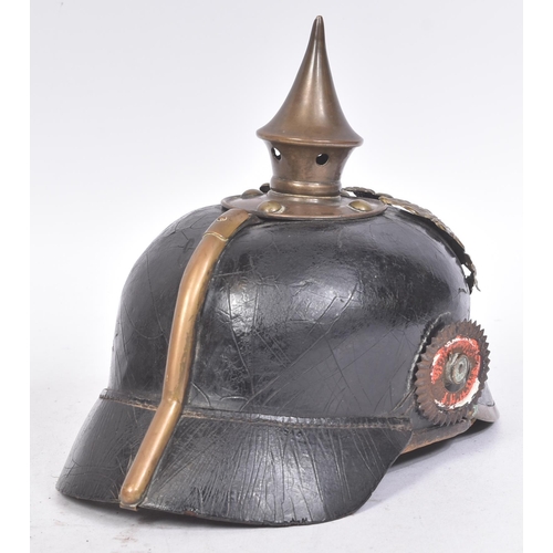 344 - A WWI First World War Imperial German Army / Prussian M15 pickelhaube uniform helmet. Leather constr... 