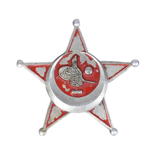 35 - An original WWI First World War Turkish / Ottoman Empire Gallipoli Star medal. Star shaped badge wit... 