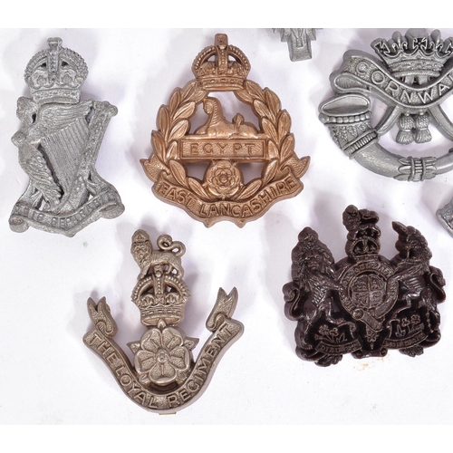 357 - A collection of British War time economy cap badges to include; Royal Artillery, East Lancashire, Pa... 