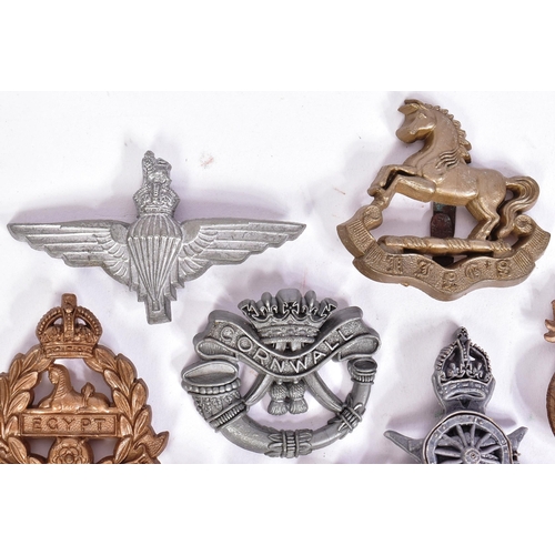 357 - A collection of British War time economy cap badges to include; Royal Artillery, East Lancashire, Pa... 