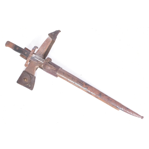 49 - A 19th Century Portuguese M1885 Guedes rifle bayonet with axe. The bayonet having a wooden grip, cro... 
