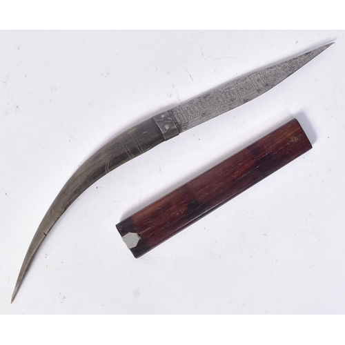 63 - An early 20th Century Iranian / Persian dagger with a curved bone hilt tapering to a point and inlai... 