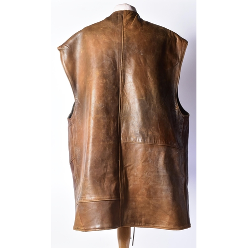 75 - A WWII Second World War British Army brown leather jerkin. The single-breasted, four-buttoned, sleev... 