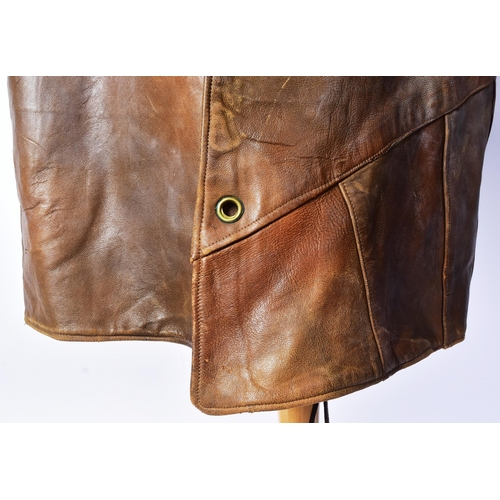 75 - A WWII Second World War British Army brown leather jerkin. The single-breasted, four-buttoned, sleev... 