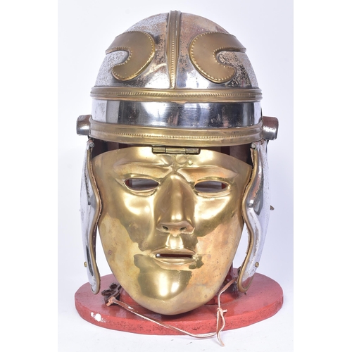 79 - A reenactment Roman Gladiator / Cavalry style helmet. Steel with brass accents, solid brass face mas... 