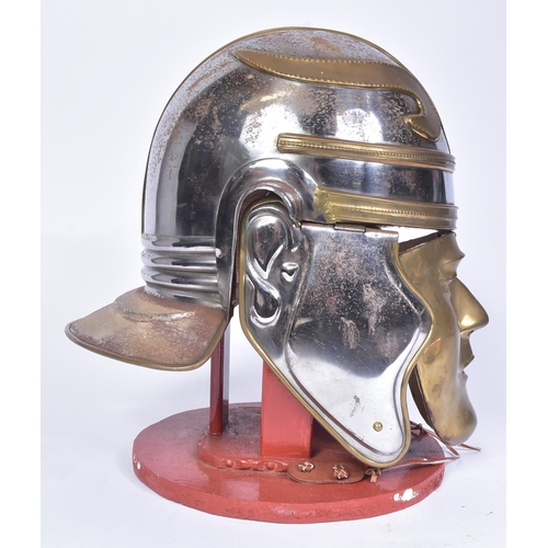 79 - A reenactment Roman Gladiator / Cavalry style helmet. Steel with brass accents, solid brass face mas... 