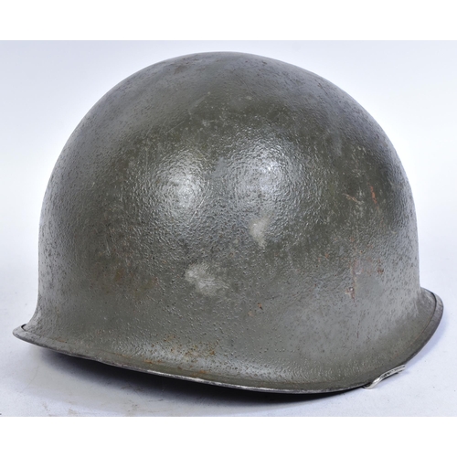 85 - A WWII Second World War US United States M1 McCord made steel combat helmet shell. Marked to the ins... 