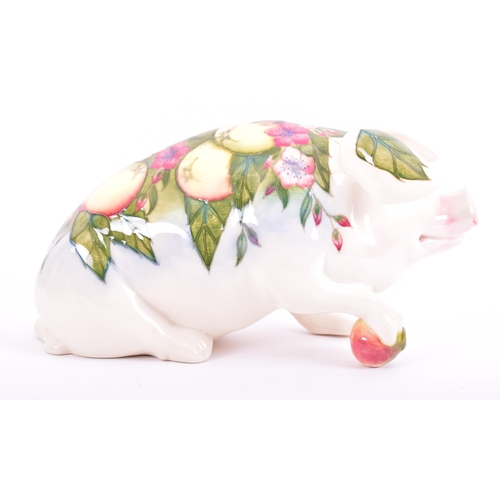 1 - Moorcroft Pottery - a vintage 1990s ceramic Peter the Pig figurine. The pig designed by Roger Mitche... 