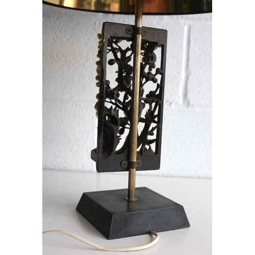 103 - A vintage 20th century 1960s gilt and ebonised wood table lamp light. The lamp having a new black sh... 