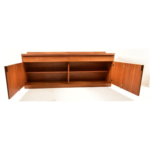 104 - A Danish retro mid 20th century teak wood sideboard credenza. The sideboard having a straight galler... 