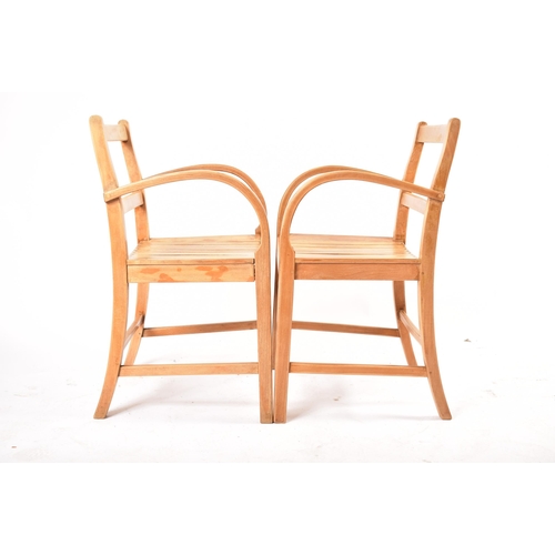 112 - A set of four RAF Air Ministry mid 20th century circa 1960s oak carver chairs. Each chair having lad... 