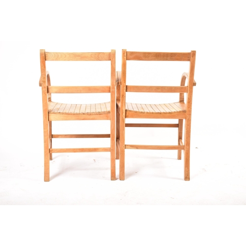 112 - A set of four RAF Air Ministry mid 20th century circa 1960s oak carver chairs. Each chair having lad... 